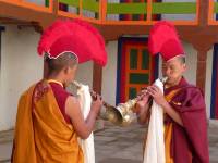 Monks playing the gyaling clarinets
